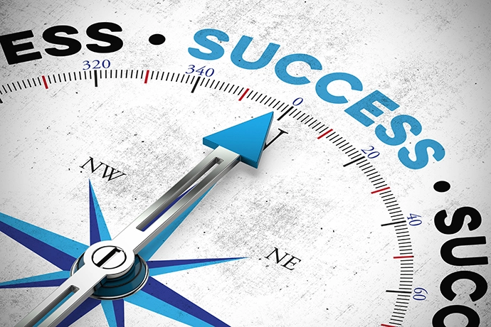 Compass showing success direction